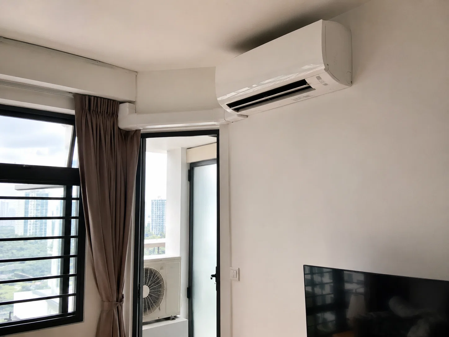 Installed split-system aircon in a Singapore apartment.