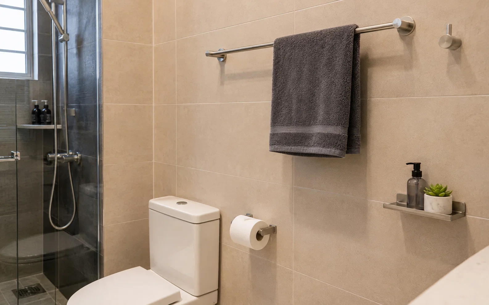 Installed bathroom accessories in a Singapore bathroom.