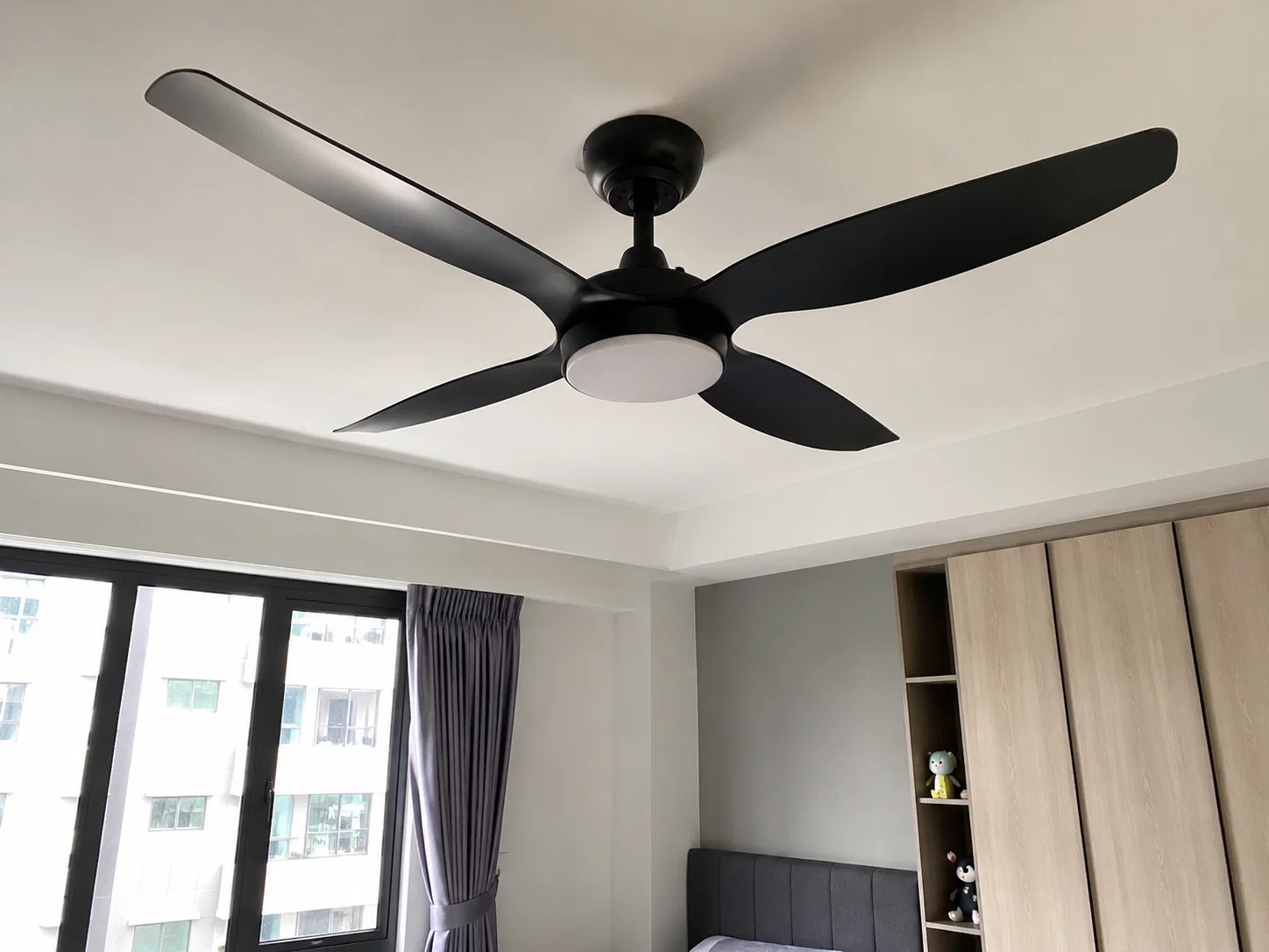 Installed ceiling fan in a Singapore room.
