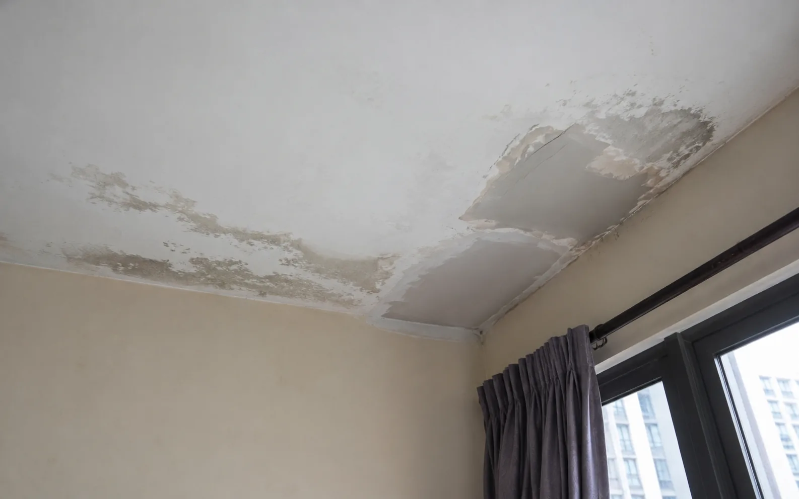 Ceiling leakage requiring repair in a Singapore property.