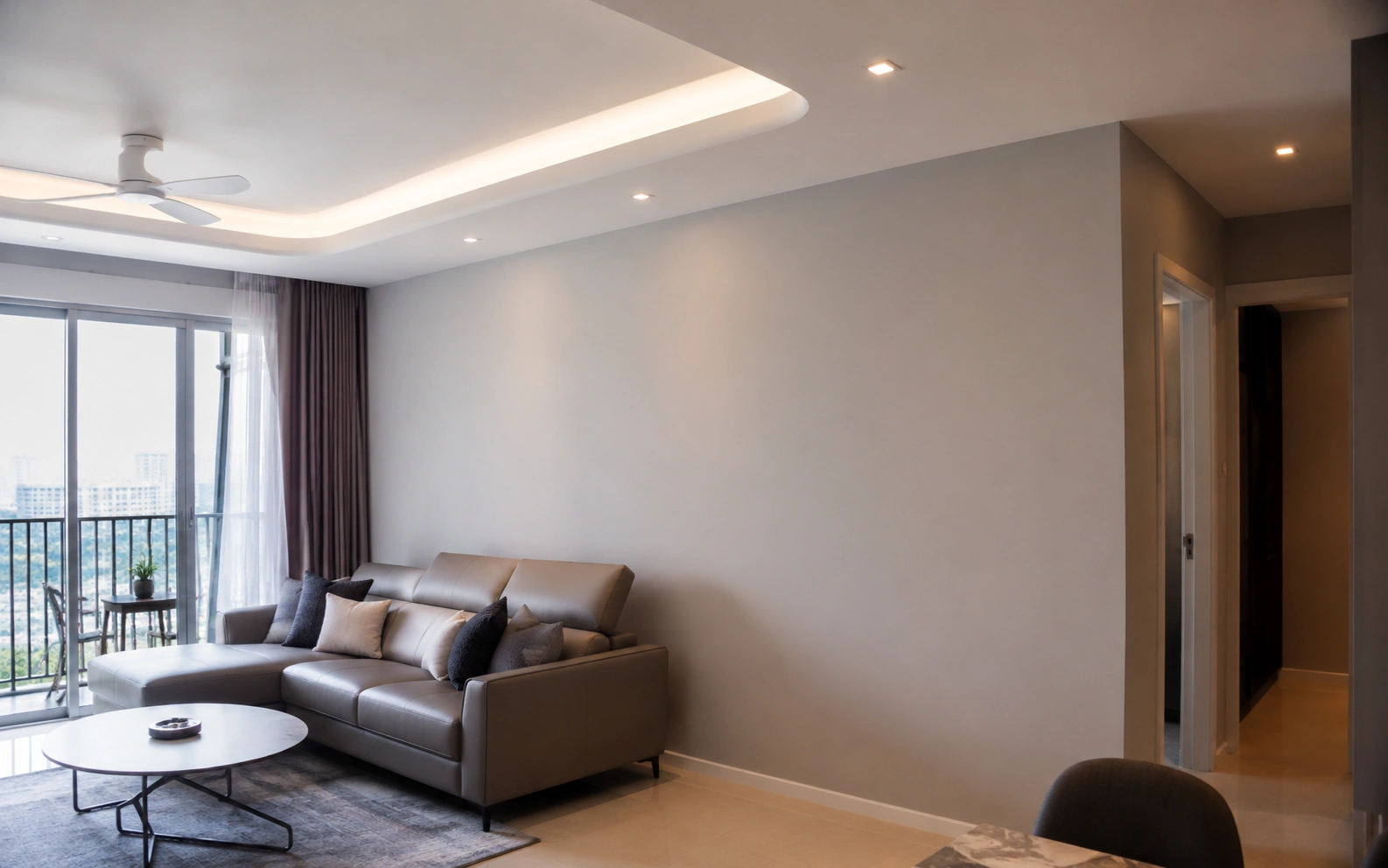 Painter applying a fresh coat to an HDB wall in Singapore.